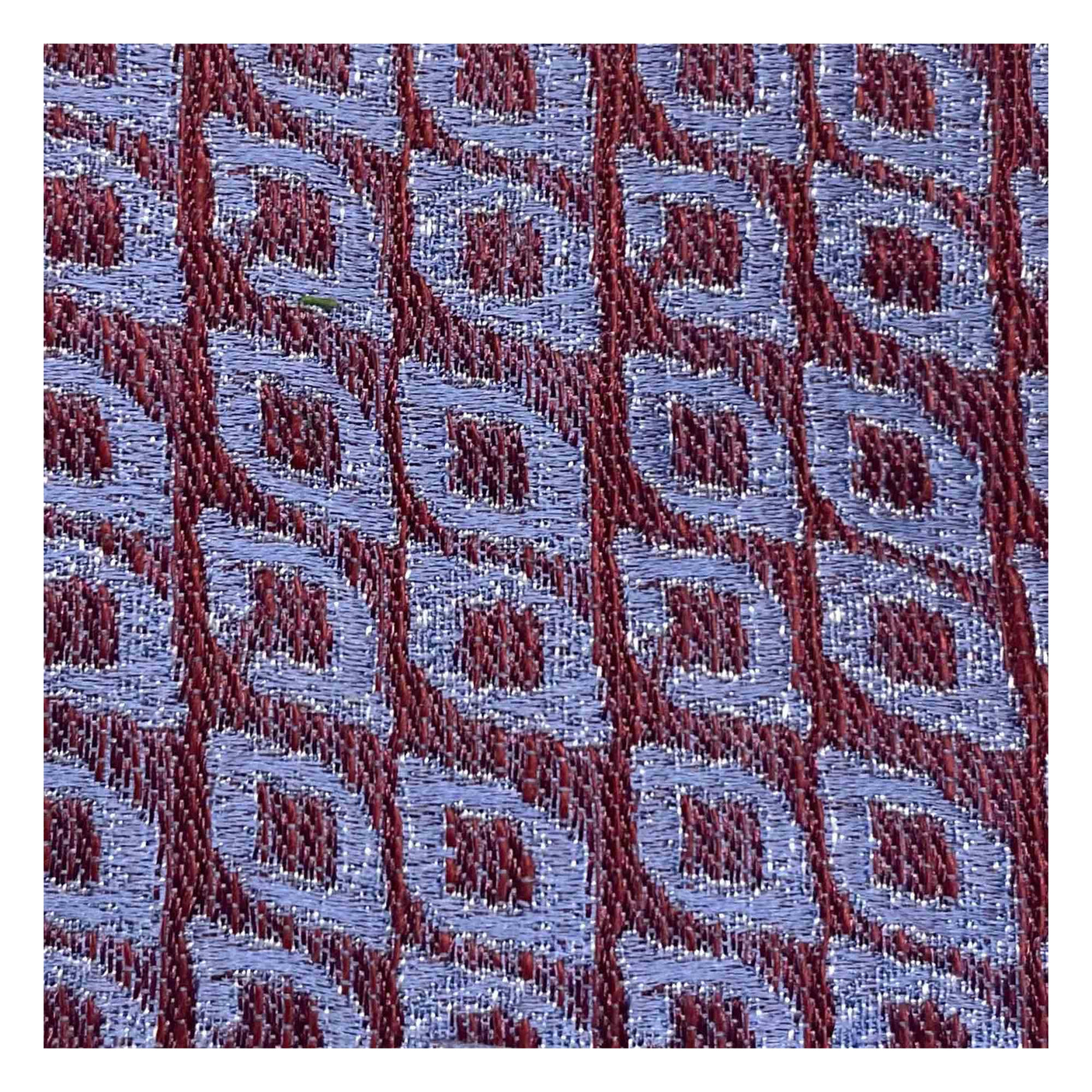 Tie with burgundy and sky blue oval pattern