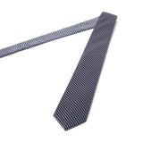 Cravate à motif géométrique argent et bleu marine