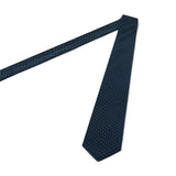 Cravate bleu marine à pois blancs